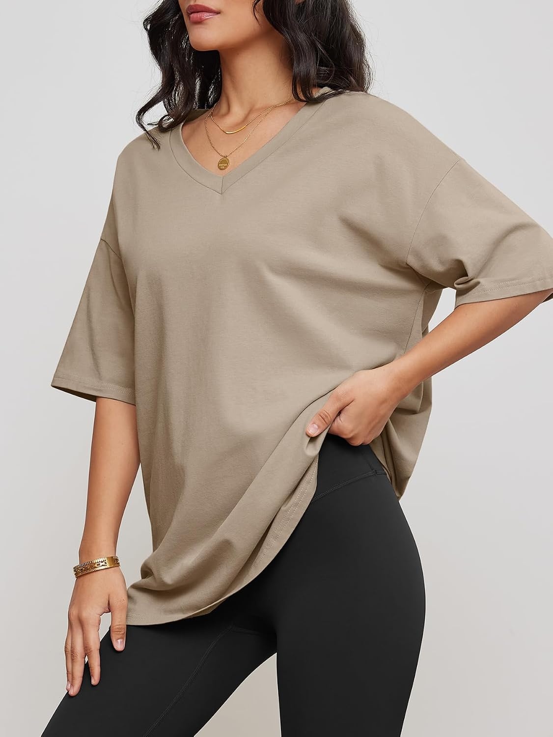 image:imageATHMILE Womens Oversized Shirts V Neck Plus Size Spring Workout Summer Tops Beach Vacation 2026 Gym Clothes Basic TeeKhaki