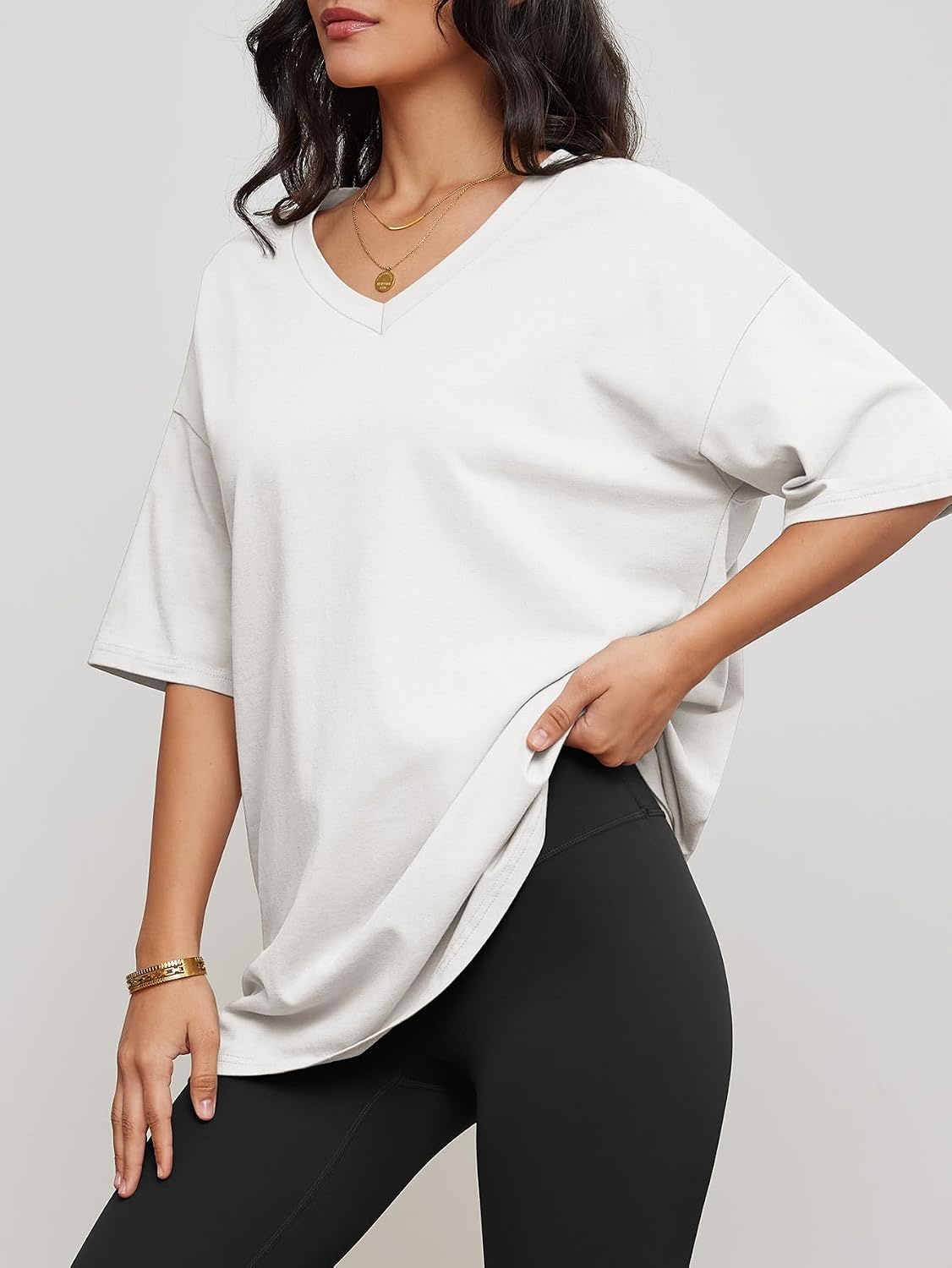 image:imageATHMILE Womens Oversized Shirts V Neck Plus Size Spring Workout Summer Tops Beach Vacation 2026 Gym Clothes Basic TeeWhite
